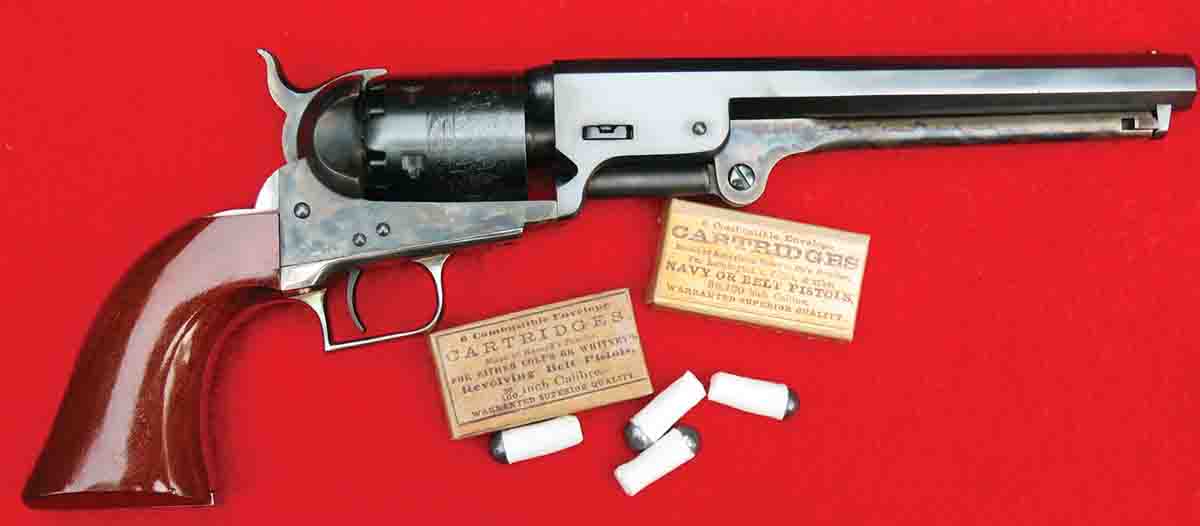 The Colt Navy revolver and the new Buffalo Arms combustible cartridges. Note the period labels on the cartridge boxes.